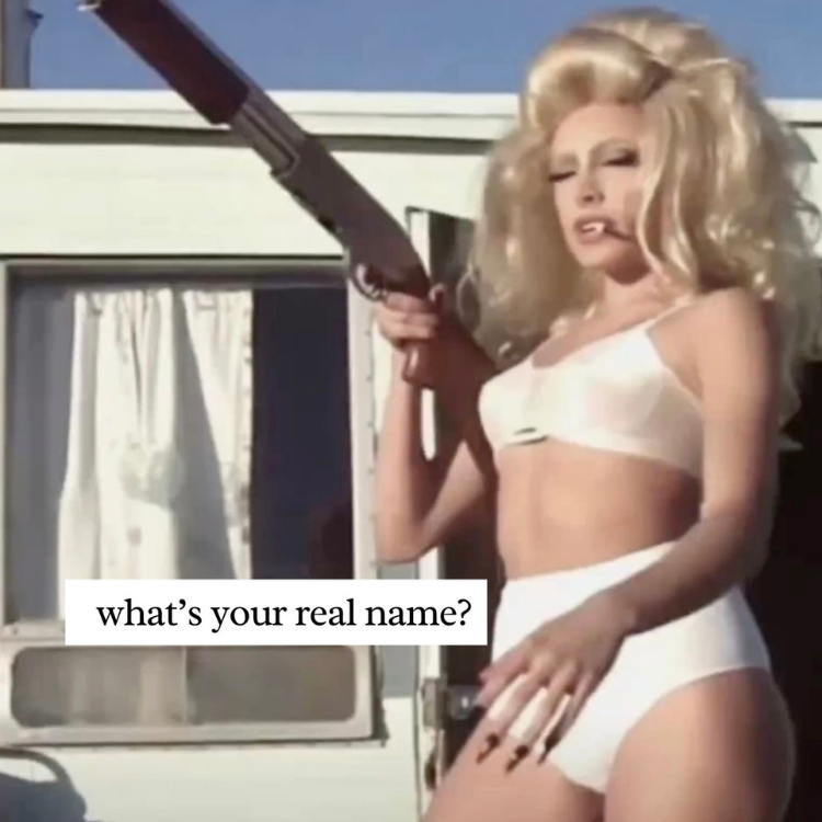 a woman in white bra and panties walking out of a trailer with a shot gun with the caption what’s your real name. stripper humor